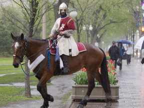 Vincent Gabriel Kirouac rides through Ottawa in May 2012 on his quest to raise awareness of chivalry. Chris Mikula / The Ottawa Citizen