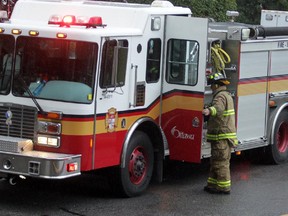 OTTAWA, ON: SEPTEMBER 8, 2012 - Firefighters battle a blaze at a townhouse, unit 102-1900 Marquis Ave. in Ottawa on Saturday, September 8, 2012. The fire started in the kitchen and caused $200,000 in damages. Three occupants escaped without harm. (photo by Mike Carroccetto / The Ottawa Citizen)��� (for WEB / CITY story by BROWNLEE) NEG# 110231