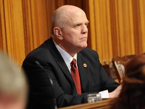 OTTAWA, ONTARIO: FEBRUARY 28, 2012 -- Former Ottawa Chief of Police, now Senator, Vern White takes his seat in The Senate after his swearing in ceremony.
Credit: Denis Drever/Senate of Canada