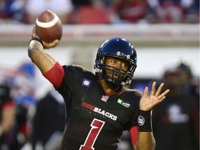 Ottawa Redblacks QB Henry Burris throws down field during CFL first quarter action against the Montreal Alouettes in Montreal on Friday Aug. 29, 2014.