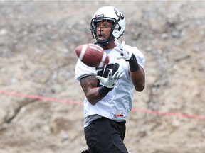 Paris Jackson of the Ottawa RedBlacks catches the football during practice at TD Place in Ottawa, July 09, 2014. (Jean Levac / Ottawa Citizen)  ORG XMIT: 0710 redblacks14