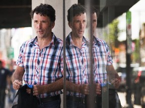 Paul Dewar, NDP MP for Ottawa Centre, leaves The Glebe Emporium on Bank St. while visiting businesses in The Glebe in August, 2014