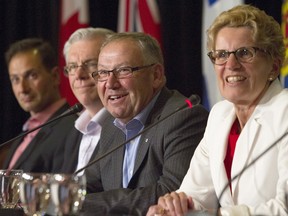 Ontario Premier Kathleen Wynne (right) organized a premiers' conference in Niagara-on-the-Lake in 2013; P.E.I. Premier Robert Ghiz is running one this week in Charlottetown. Both have relied on corporate sponsors to defray costs.