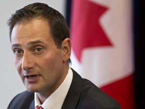 Premier Robert Ghiz , of P.E.I. fields a question at a Council of Atlantic Premiers meeting in Saint John, N.B. on Monday, May 26, 2014.