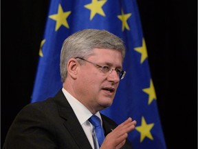 Prime Minister Stephen Harper takes part in a Q and A session in The Hague, Netherlands, on Monday, March 24, 2014.