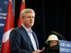 Prime Minster Stephen Harper makes an announcement during a media event at Northlands College in Air Ronge, Sask., Wednesday, July 30, 2014.