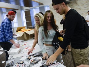 Student volunteers put together a welcome package for the new students at Carleton University this week.