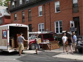 Students are busy moving into new houses and apartments on the last weekend before the fall term of university begins, especially in the neighbourhood of Sandy Hill, which is located next to the University of Ottawa, on Aug. 30, 2014.