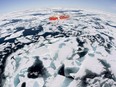 The Canadian Coast Guard icebreaker Louis S. St-Laurent makes its way through the ice in Baffin Bay on July 10, 2008.