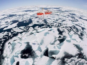 The Canadian Coast Guard icebreaker Louis S. St-Laurent makes its way through the ice in Baffin Bay on July 10, 2008.  The Canadian government doesn't appear ready to make a decision on its place in on the Arctic Fibre project, and switch over three-quarters of its Internet services in the North to broadband cable from satellite services.