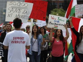 The Kurdish Community of Ottawa held a protest against the actions of the Islamic State of Iraq and the Levant (ISIL), better known to some as the Islamic State of Iraq and Syria, in front of Parliament Hill on Wednesday.