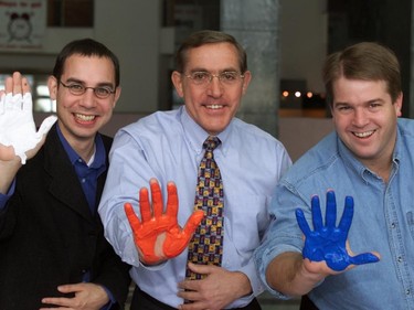 Regional Politicians give their hand prints to create an anti-racism poster at RMOC on October 15, 1999.Regional Councillors Alex Munter, left, Peter Hume, right, and Regional Chair Bob Chiarelli, centre, hold up their painted hands after lending their imprints to paper for an Anti-racism poster being put together by Bayshore area kids. The project is called 'Stop Racism Youth Challenge.