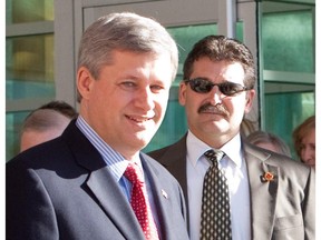 Stephen Harper with Bruno Saccomani, Canada's ambassador to Jordan, who is the former head of Harper's security detail.