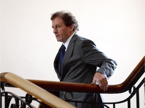 University of Ottawa President Allan Rock makes his way to deliver a statement in Ottawa on Wednesday June 25, 2014., regarding the men's varsity hockey program.