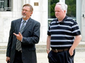 William Melchert-Dinkel, right, and his lawyer Terry Watkins leave court in Faribault, Minnesota, on Friday .