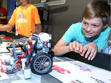 Zachery Bruketa, 10, demonstrates one of his robots during the Ottawa Maker Faire being held at the Canada Science and Technology Museum on August 17, 2014.