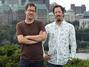Twin brothers Jason and Stefan St-Laurent are now in charge at two leading artist-run centres in Ottawa-Gatineau, with Stefan at  AXENÉO7 and Jason at SAW Gallery.  (Pat McGrath / Ottawa Citizen)