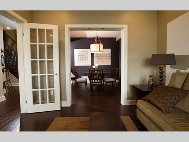 The Lancaster also features french doors between the front hallway and the living room, which, in turn, adjoins the formal dining room.