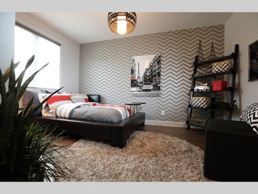 The fourth bedroom on the second floor offers a more masculine feel, with an emphasis on black and white, contemporary furnishings and a Paris vibe. This room comes with its own ensuite and walk-in closet.