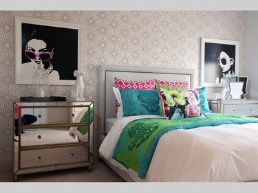 With touches of glamour, like the mirrored night stands, and hits of green, including the pendant light above the bed (not shown), this bedroom is aimed at an older daughter.