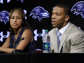 In this May 23, 2014, file photo, Baltimore Ravens running back Ray Rice, right, speaks alongside his wife, Janay, during a news conference at the team's practice facility in Owings Mills, Md.