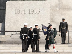 Members of the Royal Canadian Navy stand as a honour guard at the tomb of the Unknown Soldier at the Cenotaph on Aug. 16, 2012.