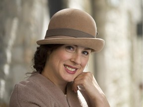 Ottawa's Saucy Milliner Kelly Dunlap wears her Downtown Abby-era cloche. The iconic, camel-coloured 1920s silhouette, flatters with its taupe band and vintage glass beads.