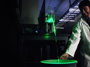 Photons and lasers are demonstrated at the University of Ottawa's Advanced Research Complex during the official opening on Tuesday.