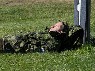 A soldier grabs a few winks in the warm sunshine as the annual Canadian Armed Forces Small Arms Concentration (CAFSAC) was held at the Connaught Ranges and Primary Training Centre near Shirley's Bay.