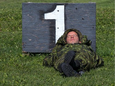 A soldier grabs a few winks in the warm sunshine as the annual Canadian Armed Forces Small Arms Concentration (CAFSAC) was held at the Connaught Ranges and Primary Training Centre near Shirley's Bay.