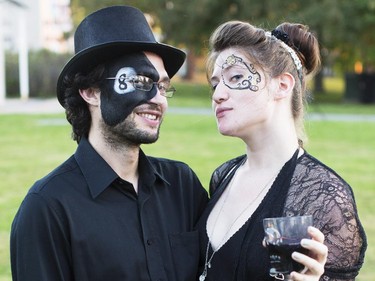 Aaron Maloney Roos, left, and Laura Grove pose for the camera at the 2014 Harvest Noir picnic, Sept. 27, 2014.