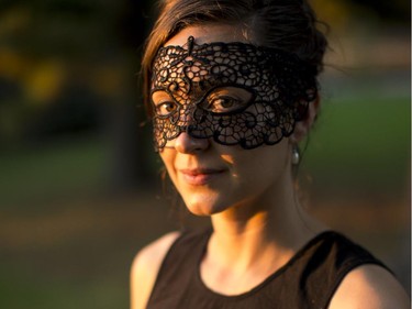 Alexandra Eutenier is bathed in the light of a setting sun at the 2014 Harvest Noir picnic.