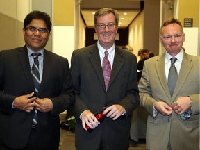 Mayoral candidates, from left, Anwar Syed, Jim Watson and Mike Maguire atternded Wednesday night's second mayoralty debate at the Ottawa Convention. Centre. The debate was focused on the environment.