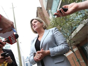 Andrea Horwath talks to reporters in Ottawa, September 10, 2014. The Ontario NDP leader is in town following her party's disappointing showing in the June election.