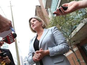 Andrea Horwath talks to reporters in Ottawa, September 10, 2014.