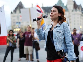 Anne-Marie Roy, president of the Student Federation of the University of Ottawa, speaks at a May Day rally in Ottawa on May 1, 2013. She is speaking out about an online conversation among five fellow students in which she was the target of sexually graphic banter.