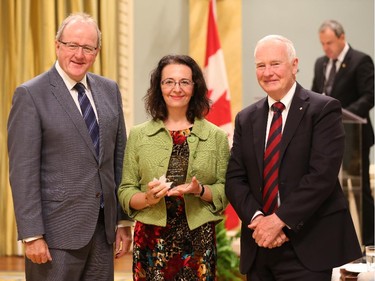 Aspa Kotsopoulos, receives on behalf of her team, the 2014 Public Service Award of Excellence 2014 for Official Languages. The Public Service of Canada salutes Guillaume Castonguay and Aspa Kotsopoulos for setting a new standard in the use of both official languages during licence renewal proceedings. Working hand in hand, these two employees led the renewal process for CBC/Radio-Canada, ensuring that both official languages were respected. Their primary focus reflected the idea that CBC/Radio-Canada is a pan-Canadian service with a mandate to provide programming to Canadians in the official language of their choice, no matter where they live in the country. Members of both official language groups felt respected and heard throughout this important public process.