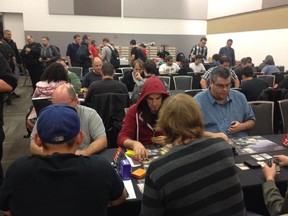 At the Magic the Gathering qualifying tournament, players compete for the right to go pro. Sept. 13, 2014