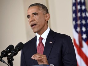 President Barack Obama addresses the nation from the Cross Hall in the White House in Washington, Wednesday, Sept. 10, 2014. In a major reversal, Obama ordered the United States into a broad military campaign to "degrade and ultimately destroy" militants in two volatile Middle East nations, authorizing airstrikes inside Syria for the first time, as well as an expansion of strikes in Iraq.