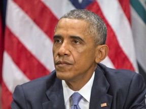 President Barack Obama listens during a bilateral meeting with Iraqi Prime Minister Haider al-Abadi at the United Nations headquarters, Wednesday, Sept. 24, 2014.