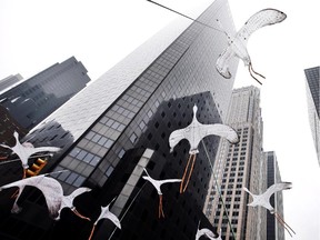 Bird-shaped kites are held in the air as demonstrators make their way down Sixth Avenue during the People's Climate March, Sunday, Sept. 21, 2014, in New York. The march, along with similar gatherings scheduled in other cities worldwide, comes two days before the United Nations Climate Summit, where more than 120 world leaders will convene for a meeting aimed at galvanizing political will for a new global climate treaty by the end of 2015.