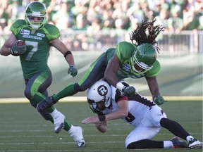 Redblacks punter Brett Maher takes down a Roughrider during last Sunday's game.