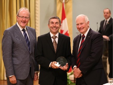 C. André Lévesque receives the 2014 Public Service Award of Excellence 2014 for Scientific Contribution. C. André Lévesque is being recognized for developing cutting-edge diagnostic protocols used in the early detection of fungal diseases that threaten Canada's agricultural crops, forests and fisheries. He leads an interdepartmental team on biosecurity research, which stands as a model of scientific integrity across international borders. His expertise was integral in thwarting the Prince Edward Island Potato Wart crisis and the invasive Asian Soybean Root Rust epidemic in Ontario and Quebec. Using next-generation DNA sequencing and macroarray diagnostics, Mr. Lévesque pioneered the way in which plant pathogens are identified and greatly reduced their impact on producers across the country, as well as on the Government of Canada's regulatory environment.