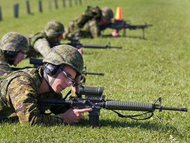 Canadian soldiers check their weapons at the annual Canadian Armed Forces Small Arms Concentration (CAFSAC) held at the Connaught Ranges and Primary Training Centre near Shirley's Bay.