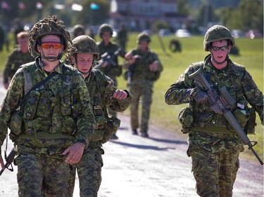 Canadian soldiers move up to the firing line as the annual Canadian Armed Forces Small Arms Concentration (CAFSAC) was held at the Connaught Ranges and Primary Training Centre near Shirley's Bay.
