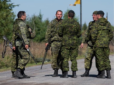 Canadian soldiers talk about their results as the annual Canadian Armed Forces Small Arms Concentration (CAFSAC) was held at the Connaught Ranges and Primary Training Centre near Shirley's Bay.