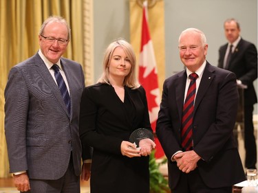 Celia Millay, receives on behalf of her team, the 2014 Public Service Award of Excellence 2014 for Excellence in Policy. The Public Service of Canada applauds this team for its innovative approach to public consultation in creating the Wireless Code. The team looked beyond traditional methods of engagement and held consultations and a discussion forum online during the hearing. They also provided an option for Canadians to participate in the public hearing using Skype, and followed Twitter to go where the conversations were happening. Its efforts allowed Canadians to be directly involved in developing and implementing the Wireless Code, while it kept the realities of the wireless service industry in mind. The success of this innovative policy approach has made it a benchmark for future initiatives.