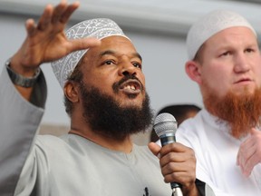 Abu Ameenah Bilal Philips (left), an Islamic scholar criticized as a hate preacher, and German Pierre Vogel, speak to their supporters during a demonstration in 2011 in Frankfurt, western Germany.
