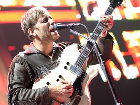 Dan Auerbach of The Black Keys performs in support of their Turn Blue World Tour at Canadian Tire Centre on Wednesday, September 17, 2014.