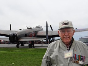 Donald Cheney attended last year's Wings Over Gatineau-Ottawa airshow to see one of only two Lancasters still able to fly. He managed to climb into the cockpit at the age of 91.  (photo courtesy of the Cheney family).